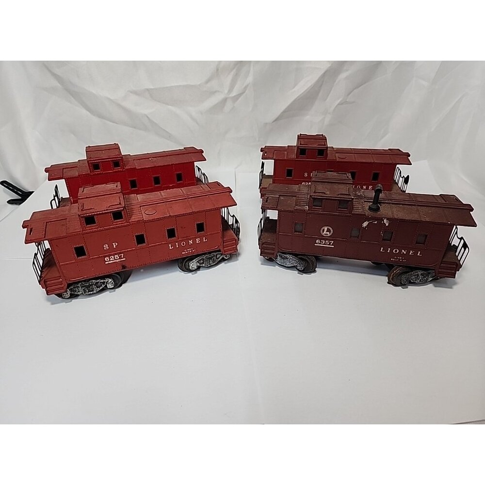 Lionel Postwar Caboose lot,3) 6257 and 1) 6357